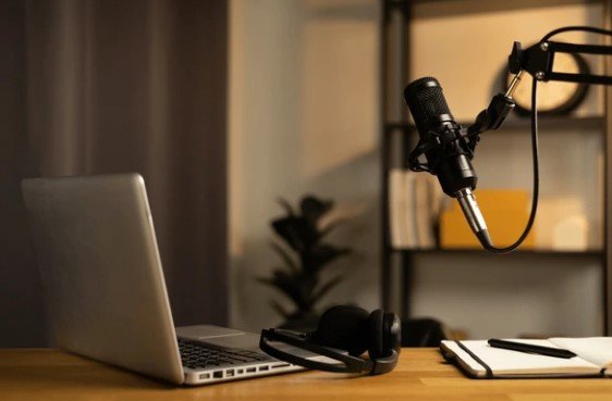 Professional podcast microphone and laptop setup in a modern Australian studio